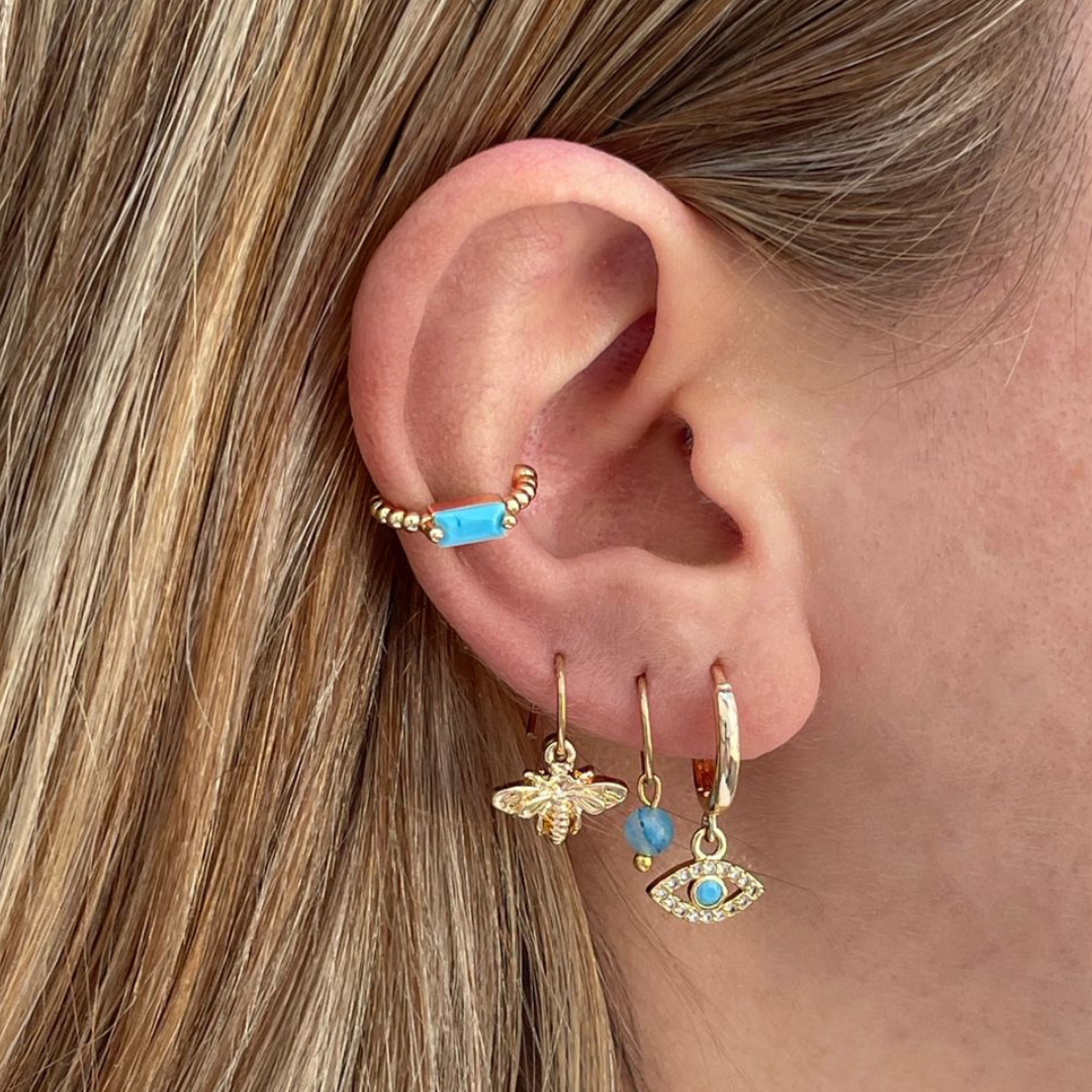 Arracada Perla Azul Acero Dorado 8mm