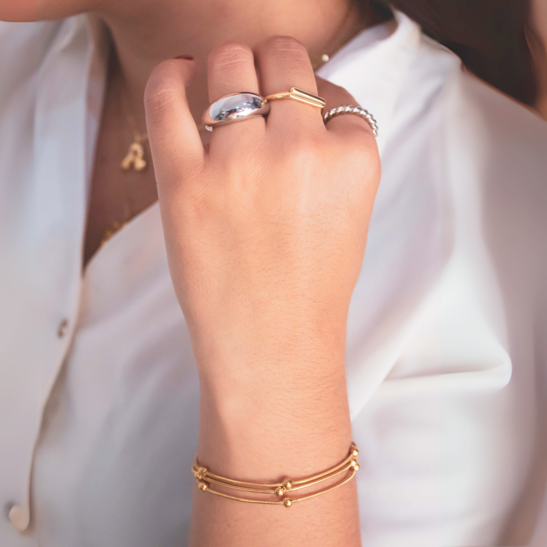 Pulsera triple bolitas
