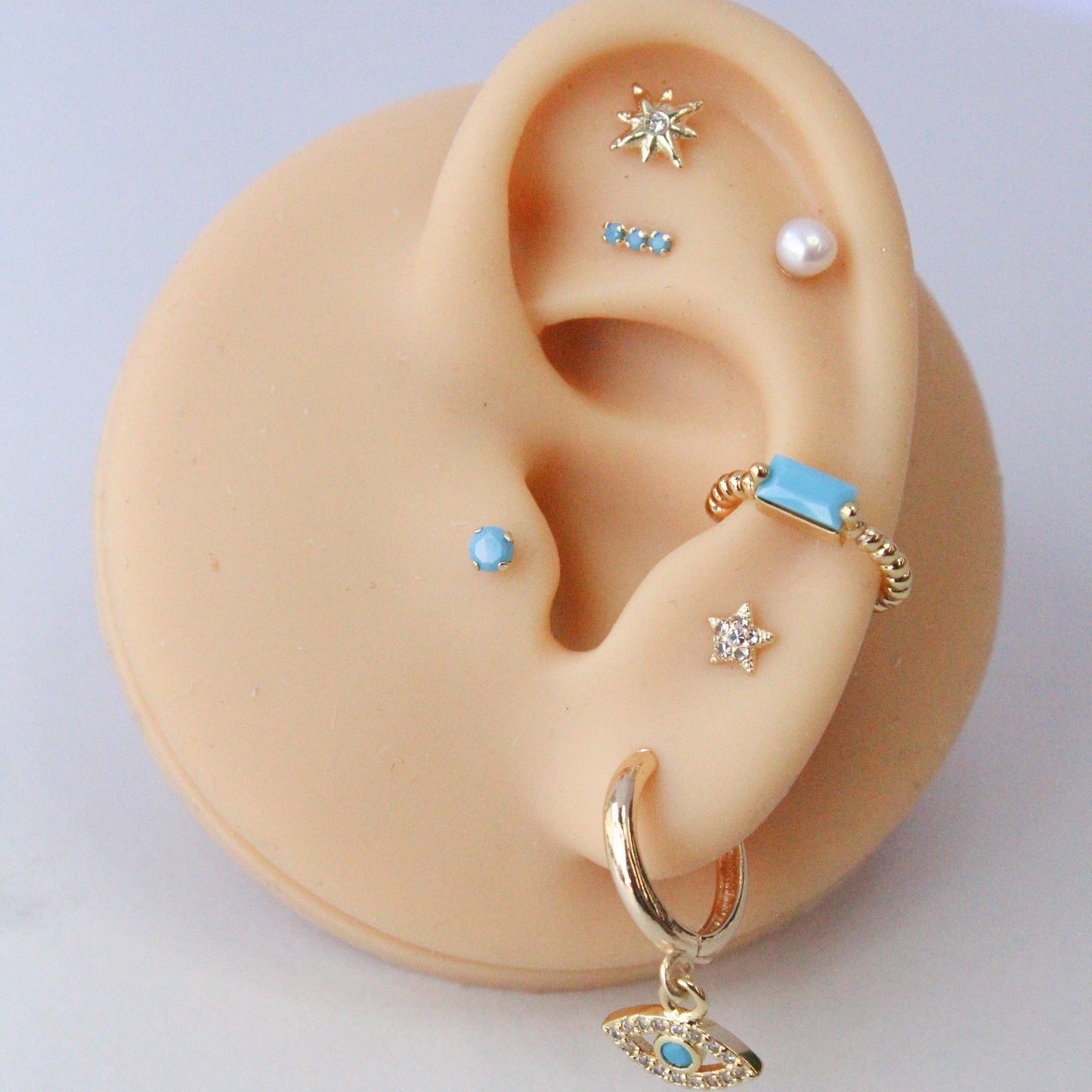 Ear cuff turquesa
