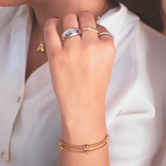 Pulsera triple bolitas