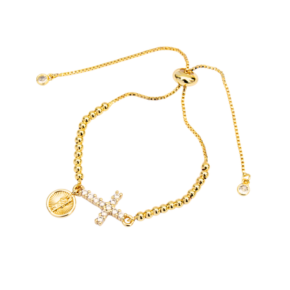 Pulsera cruz con dije