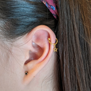 Arracada piercing acero quirúrgico con estrella 8mm